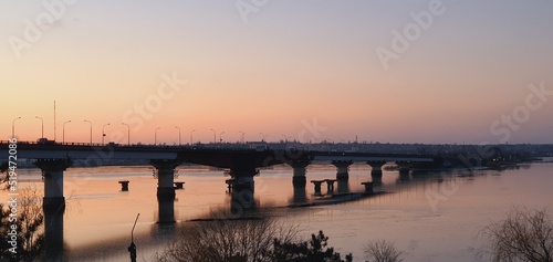 Tableau sur toile Pay attention to how beautifully the pillars on the bridge are located - the black-and-white photographs are especially beautifully emphasized where cars are visible - the outline of trucks