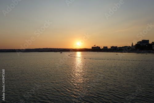 Reflection of Sun in water, Istanbul sunset on Sea of Marmara, Impressive golden sunset over the sea © fatih