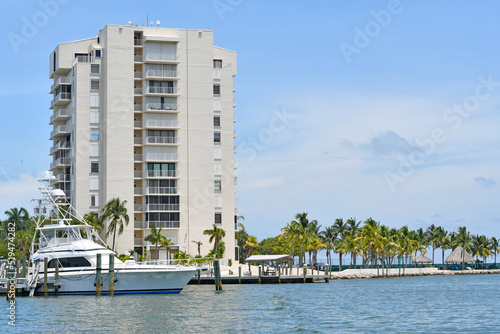 Condo with boat along the waterfront Marathon in the Florida Keys, Florida, USA. Tropical paradise vacation destination. © Ryan Tishken