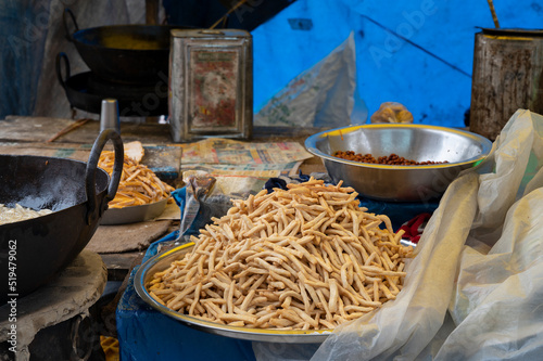 Nimki, Indian fast food snack is being prepared for sale. Durga Puja festival brings in more sale for Nimki sellers across West Bengal, India. photo