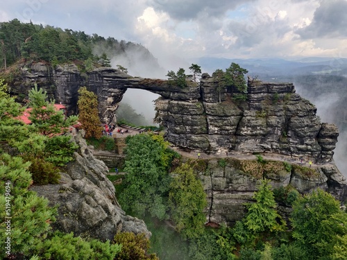 Famous Pravčice Gate landmark in Czech Switzerland National Park, Hřensko on the cloudy autumn day photo