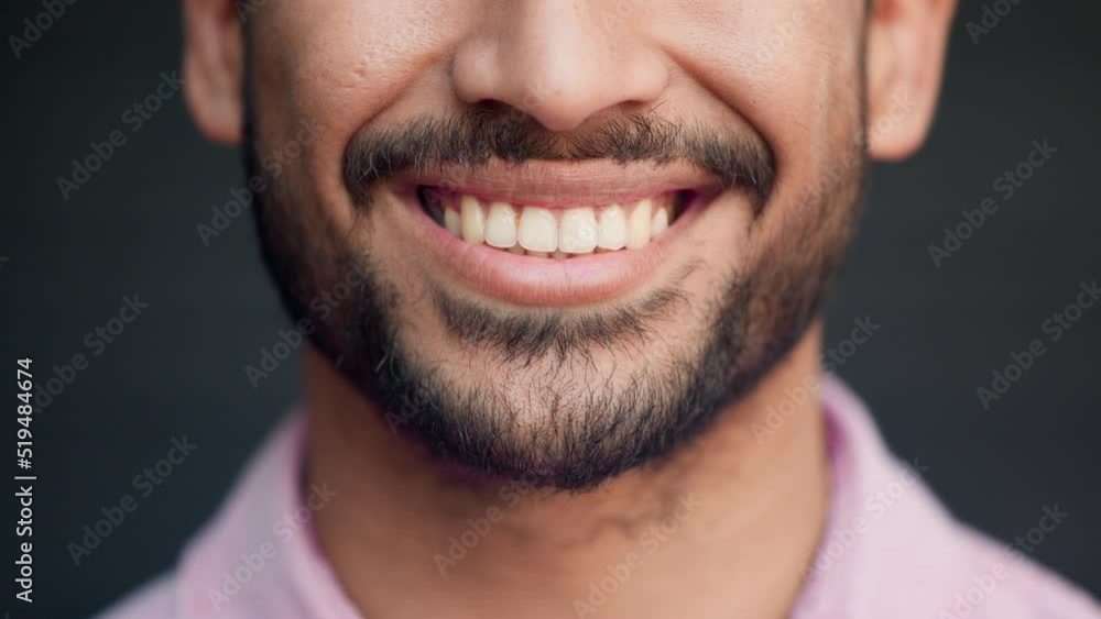 Perfect teeth of happy smiling man feeling cheerful and satisfied. Closeup mouth of confident and bearded male expressing a positive attitude and mindset. Good oral hygiene means healthier smiles Perfect teeth of happy smiling man feeling cheerful and satisfied. Closeup mouth of confident and bearded male expressing a positive attitude and mindset. Good oral hygiene means healthier smiles