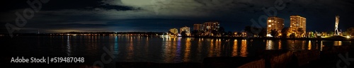 Downtown Barrie at night Centennial beach night time panorama with lights reflecting on lake 