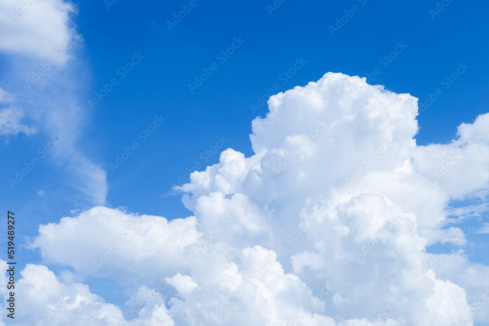 White rain cloud over blue sky background, nature and weather concept background White rain cloud over blue sky background, nature and weather concept background
