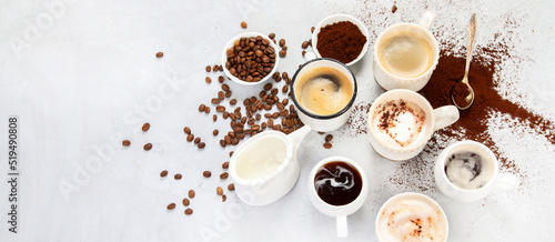 Coffee cup assortment on light background.