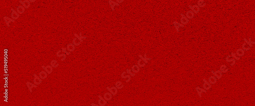 Red texture plasticine background, bright red texture of dense fabric, abstract background with red wall texture design.