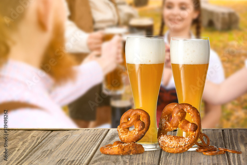 Glasses of fresh beer and p...