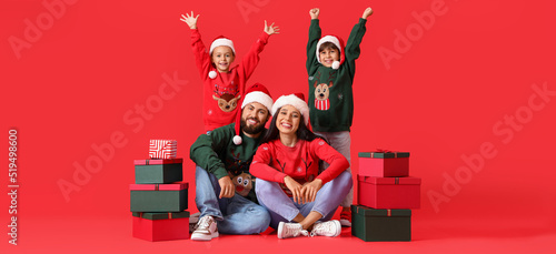 Happy family in Santa hats ...