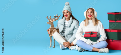 Happy sisters with Christma...