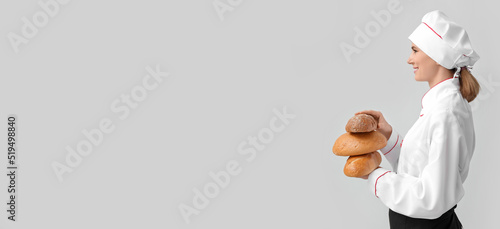 Female baker with fresh bre...
