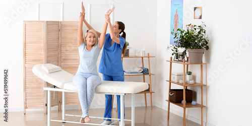 Physiotherapist working wit...