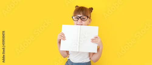 Cute little girl with book ...