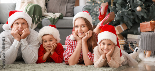 Happy family at home on Chr...