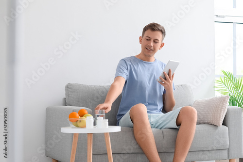 Young man with tablet compu...