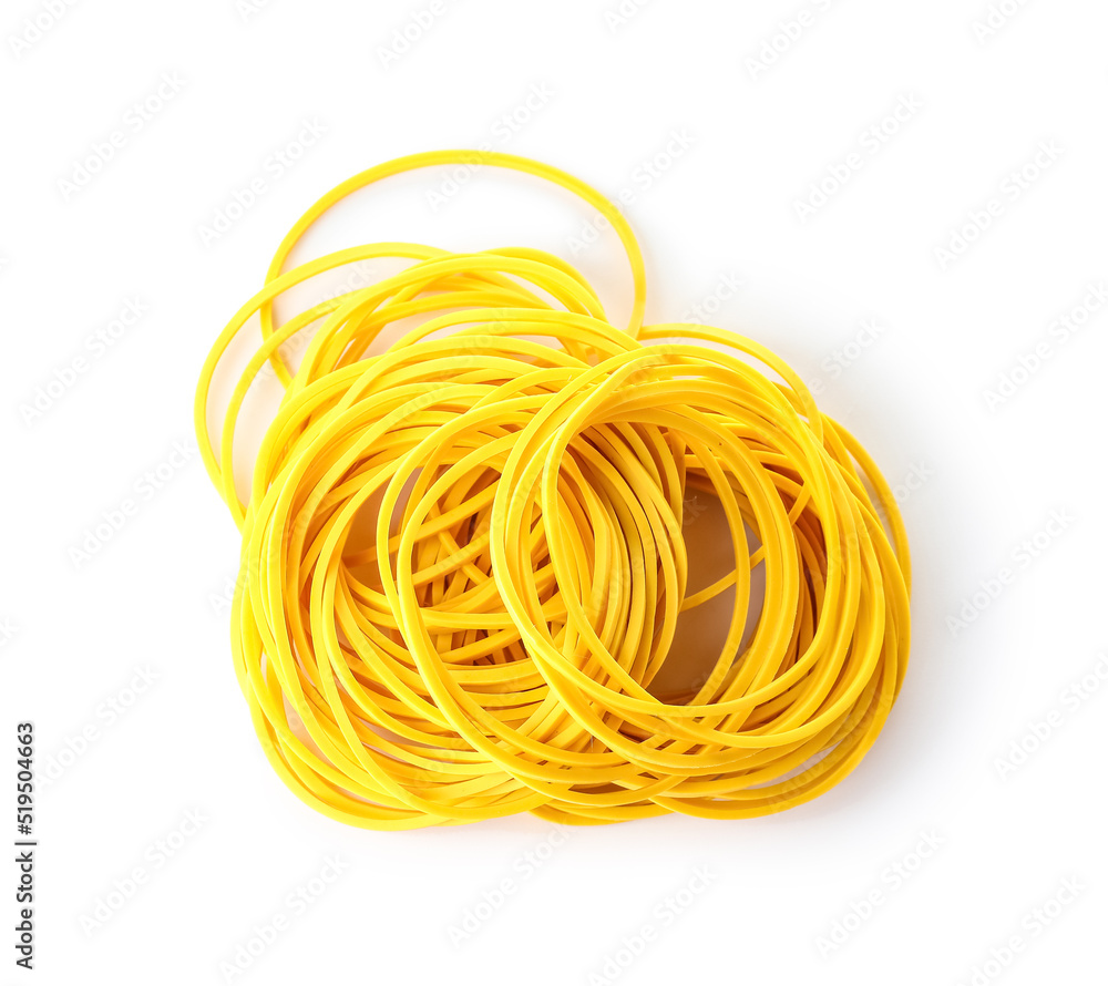 Heap of yellow rubber bands isolated on white background Heap of yellow rubber bands isolated on white background