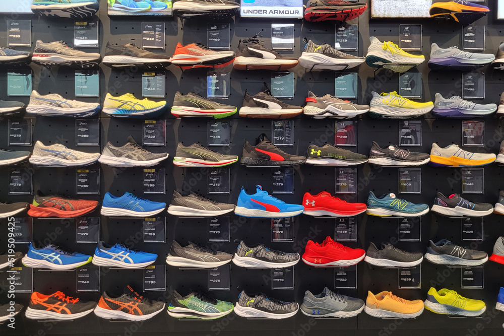 PENANG, MALAYSIA - 14 JUNE 2022: Various brands trendy sport shoe
