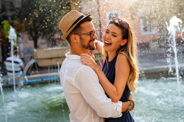 Portrait of happy couple having date and fun on vacation. People travel happiness concept.