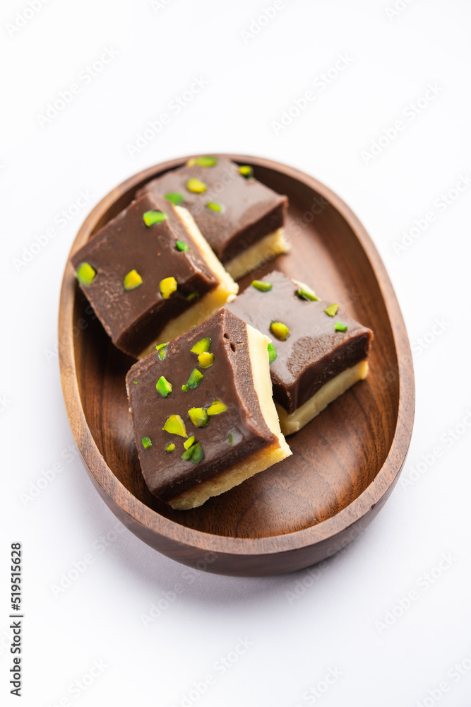 Choco Vanilla Pateesa or chocolate mawa barfi or or two layered burfi, Indian sweet or dessert Choco Vanilla Pateesa or chocolate mawa barfi or or two layered burfi, Indian sweet or dessert