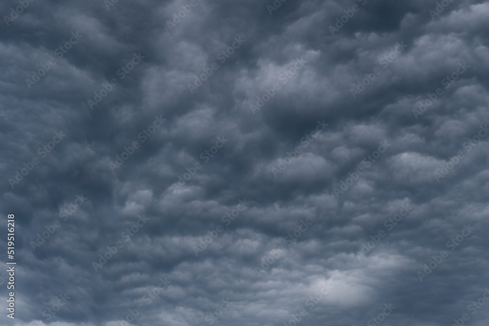 Rain clouds background. The clouds turn dark gray, like big smoke before rain. Rain clouds background. The clouds turn dark gray, like big smoke before rain.