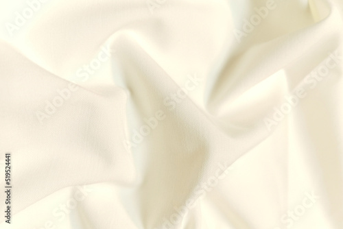 White galliano fabric crumpled or wavy fabric texture background. Abstract linen cloth soft waves. Viscose yarn. Smooth elegant luxury cloth texture. Concept for banner or advertisement. photo