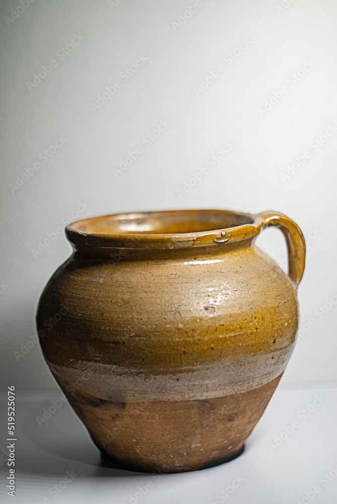 Old pot isolated on white background