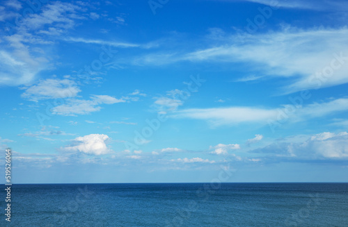 Blue sea water surface on sky