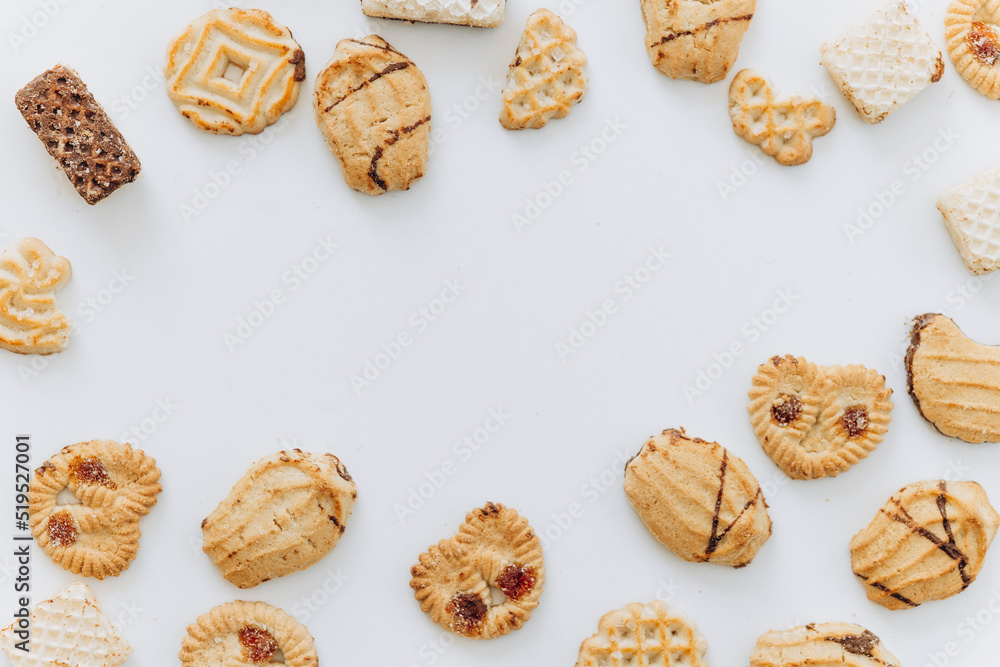 Top view different cookies on table top, Flat lay of various cookies on white background