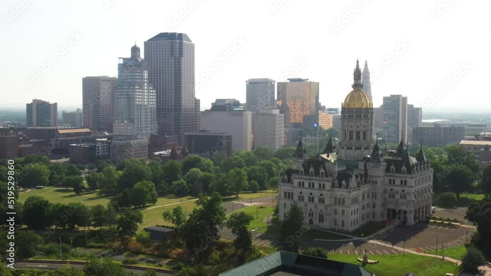 Connecticut state capitol building in Hartford, Connecticut with skyline with drone video pulling out. Connecticut state capitol building in Hartford, Connecticut with skyline with drone video pulling out.