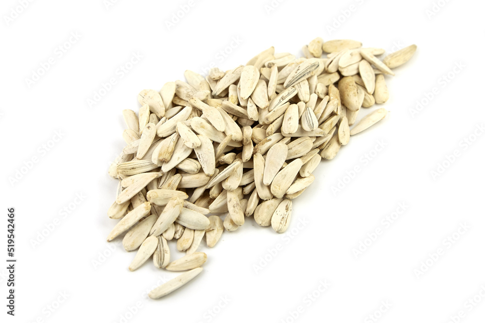 Dry organic sunflower seeds isolated on white Dry organic sunflower seeds isolated on white