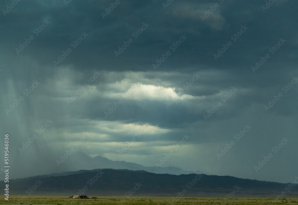 dramatic storm clouds over mountains dramatic storm clouds over mountains