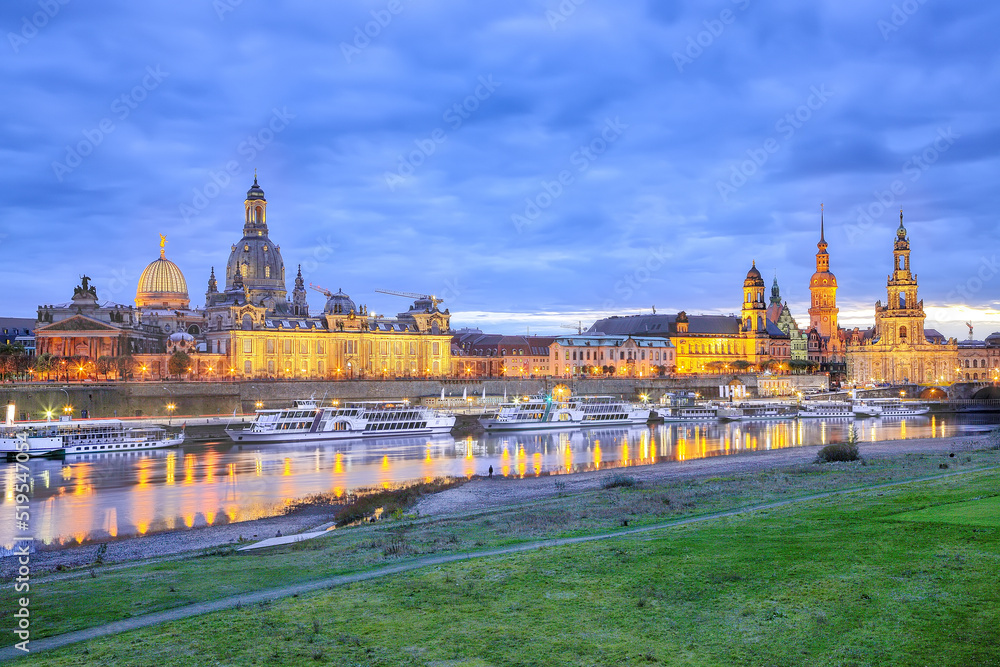 Sunset on Elbe river with panorama of Cathedral of the Holy Trinity or Hofkirche, Bruehl's Terrace or The Balcony of Europe