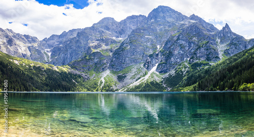 Fototapeta Naklejka Na Ścianę i Meble -  Panoramic view of Morskie Oko or Eye of the Sea, Tatra mountains near Zakopane, Poland