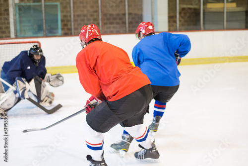 Photography Ice hockey players playing ice hockey in the ice rink in winter