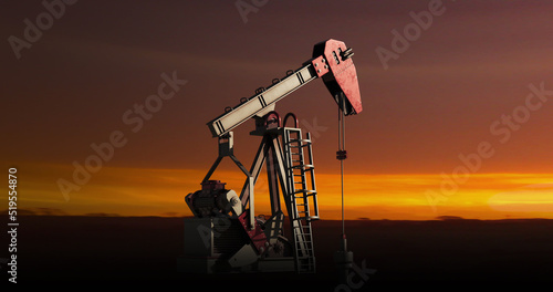 Image of working pumpjack over landscape photo