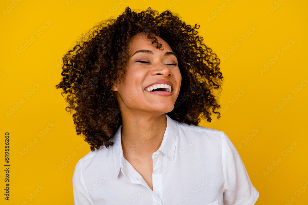 Photo of adorable gorgeous nice girl with wavy hairdo dressed white blouse toothy laughing eyes closed isolated on yellow color background Photo of adorable gorgeous nice girl with wavy hairdo dressed white blouse toothy laughing eyes closed isolated on yellow color background