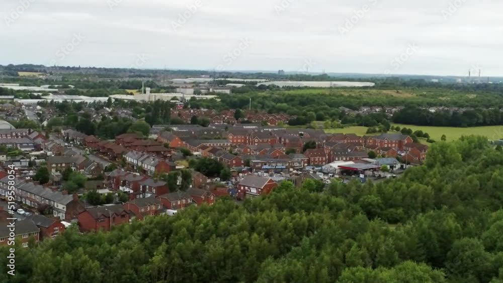 Residential homes aerial view suburban British town woodland neighbourhood community Residential homes aerial view suburban British town woodland neighbourhood community