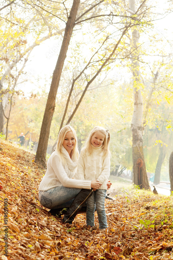 Happy joyful family, mother and daughter relax outdoor in forest Happy joyful family, mother and daughter relax outdoor in forest