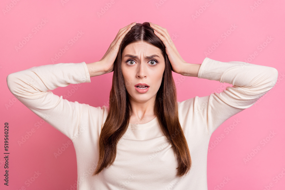Portrait of attractive worried puzzled girl wow sudden news reaction isolated over pink pastel color background Portrait of attractive worried puzzled girl wow sudden news reaction isolated over pink pastel color background