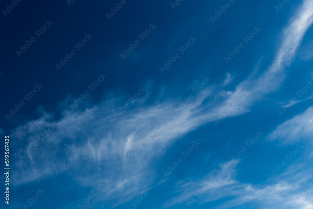 Dark blue sky atmosphere with white air clouds weather wind nature background Dark blue sky atmosphere with white air clouds weather wind nature background