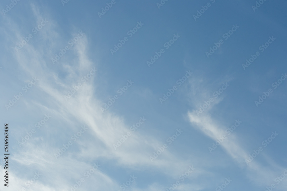 Bright blue sky in the evening with white soft clouds natural background weather air