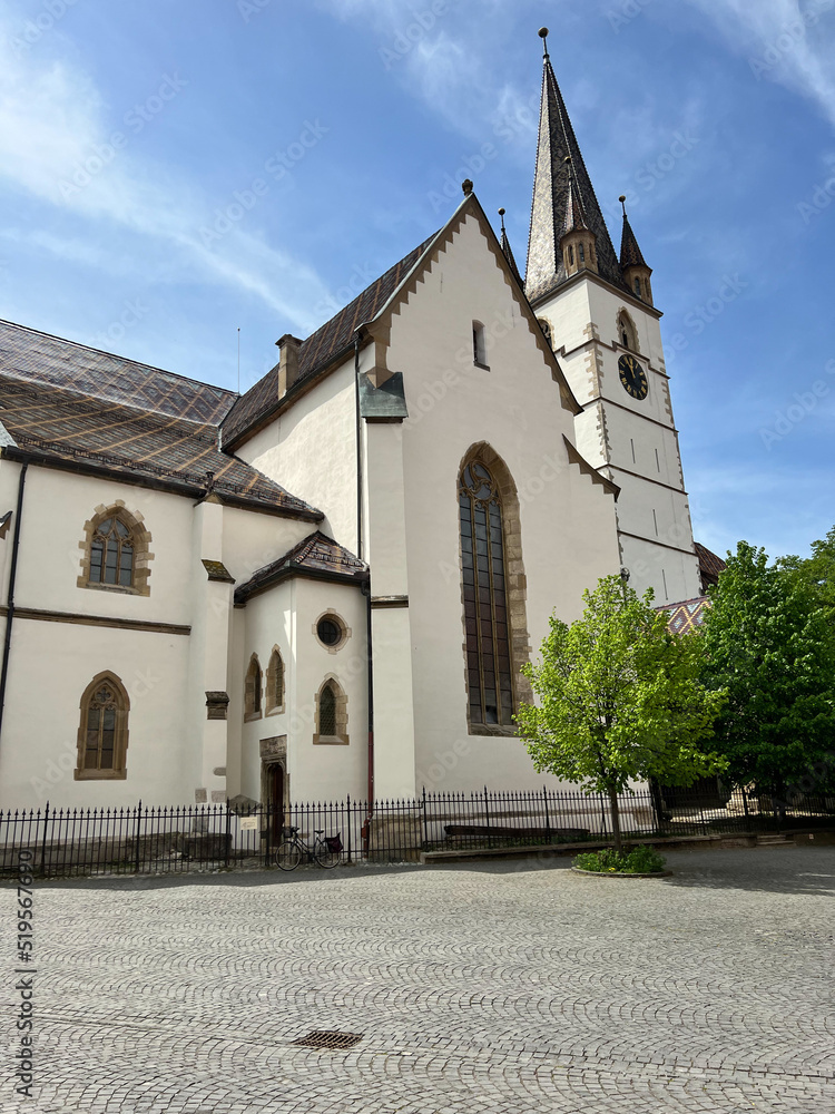 Fototapeta premium The Sibiu Lutheran Cathedral on a sunny day, Romania 2022