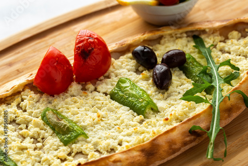 Turkish pide with sheep cheese photo