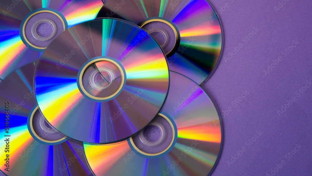 background of some colorful compact discs background of some colorful compact discs