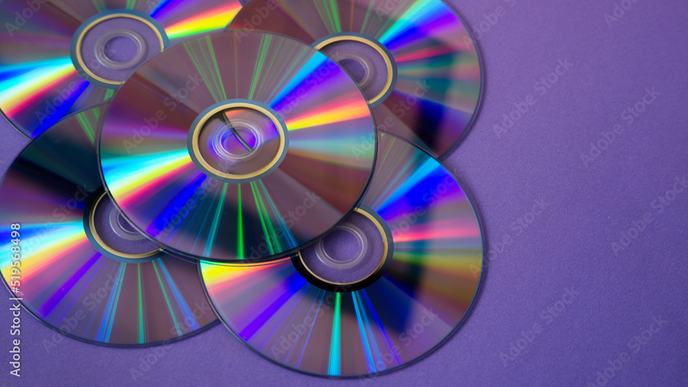 background of some colorful compact discs background of some colorful compact discs