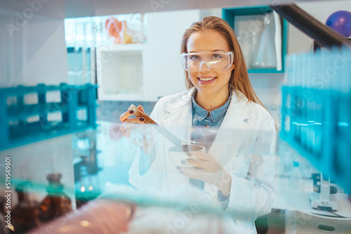 Shot of a young scientist conducting an experiment in a laboratory. Medical healthcare technology and pharmaceutical research and development concept. Young Scientist Working