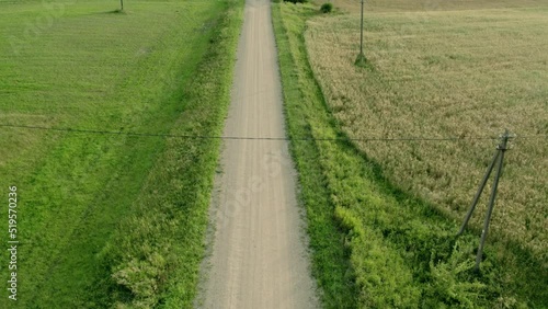 Aerial view to Lithuanian rural road.