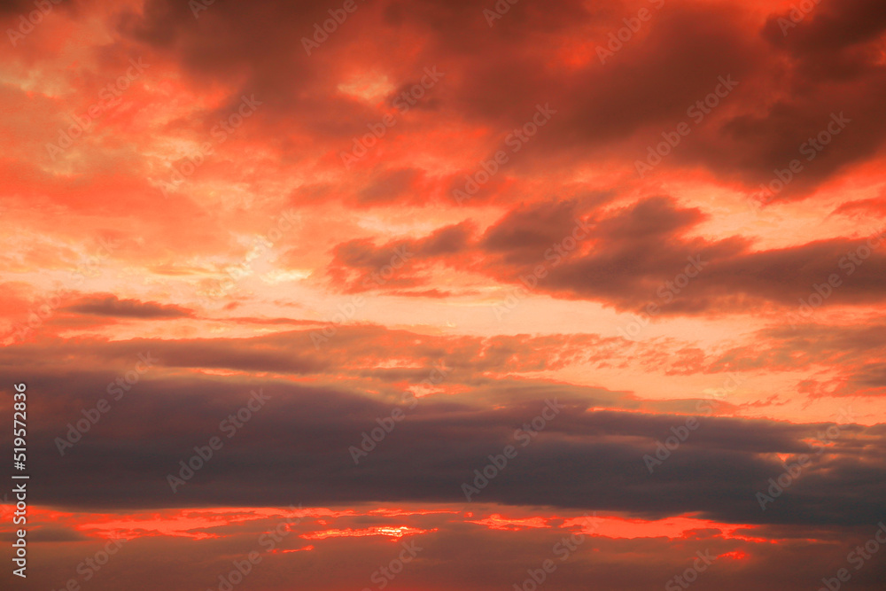 Beautiful view of orange sky with clouds at sunset