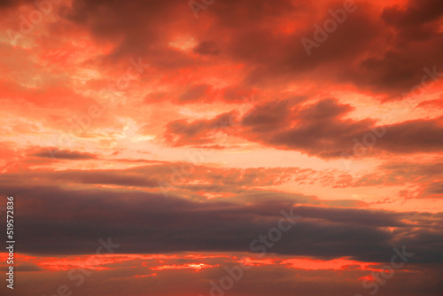 Beautiful view of orange sky with clouds at sunset © New Africa