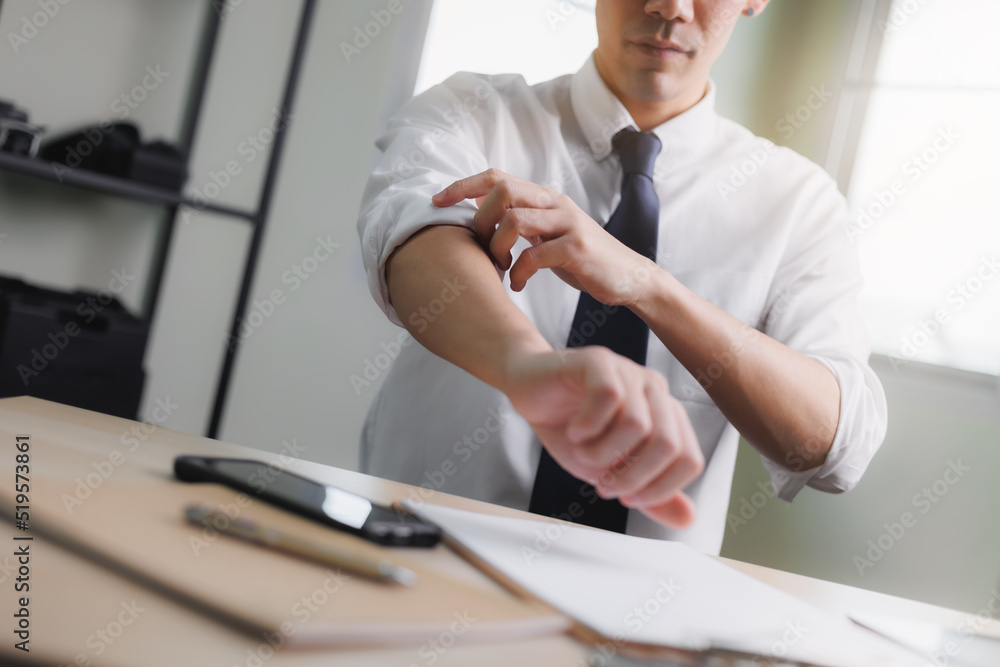 Businessman rolling up his sleeves on desk, concept of motivation, start-up, Corporate man,personnel working in office