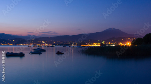City with mountain in the background at Lago di Garda